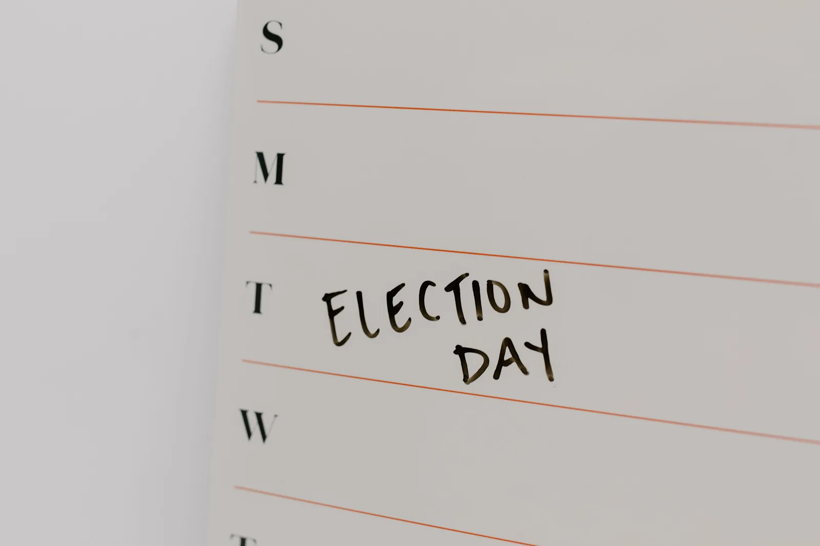 Close-up of a planner with 'Election Day' noted on Tuesday. Perfect for political event reminders. Inoculation theory persuasion: how to read a prebunk's resistance gap