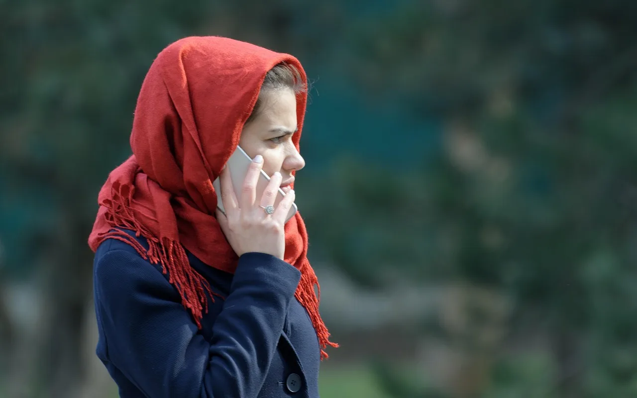 person, young, girl, speaking, phone, outdoors, park. A working test for manipulation resistance you can run today